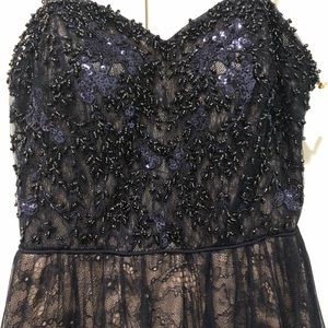 Beautiful beaded prom dress with lace skirt